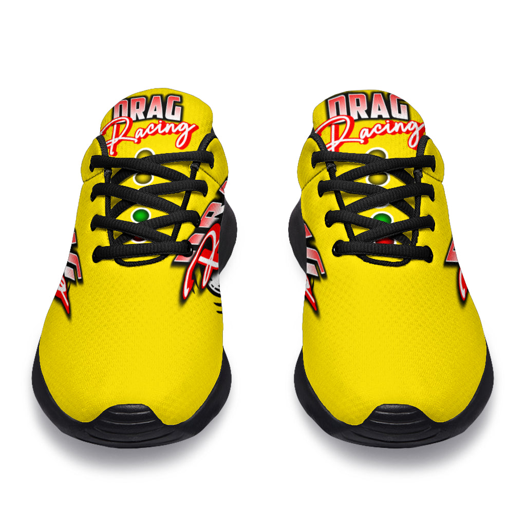 Bright yellow drag racing sneakers with breathable mesh and traction outsoles.