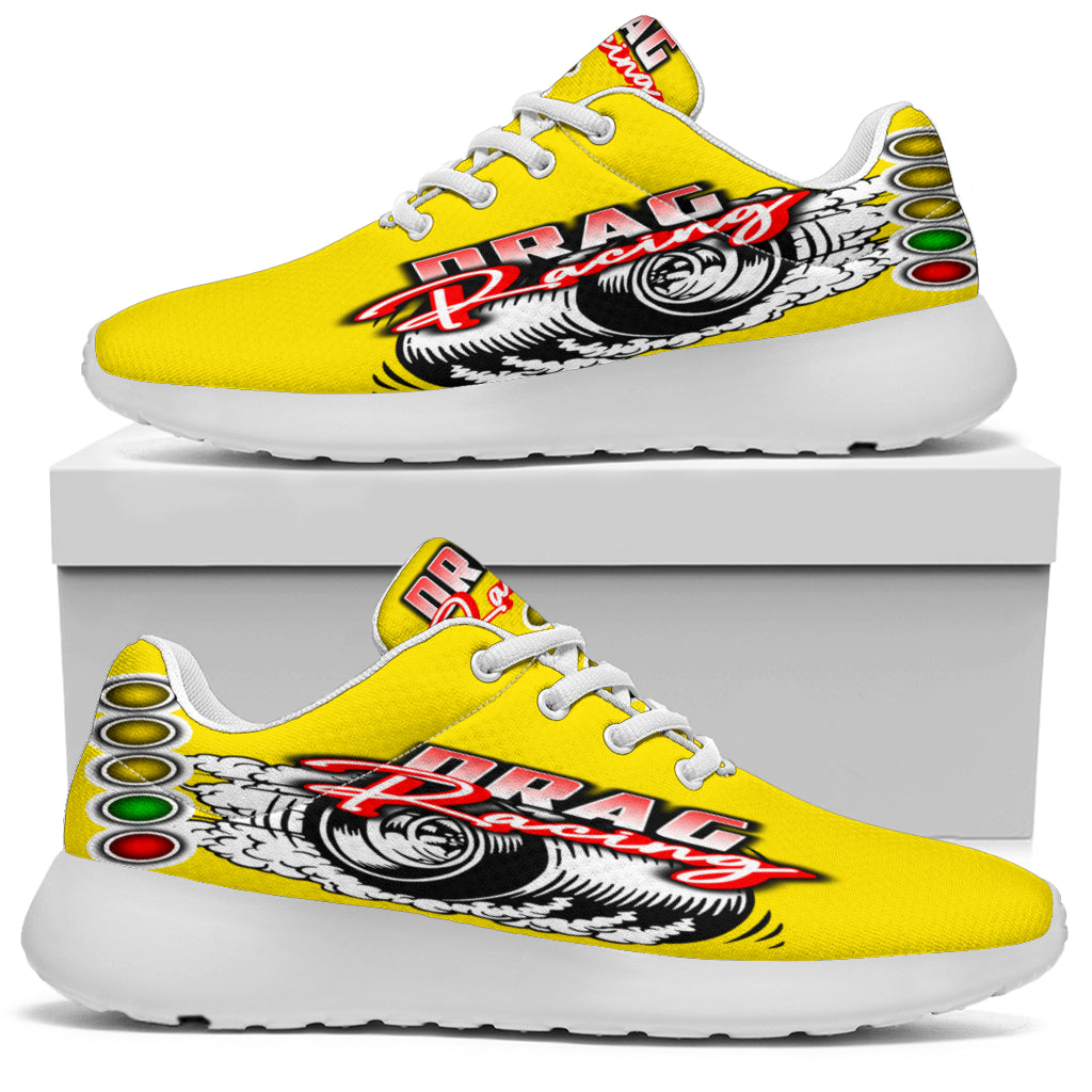 Bright yellow drag racing sneakers with breathable mesh and traction outsoles.