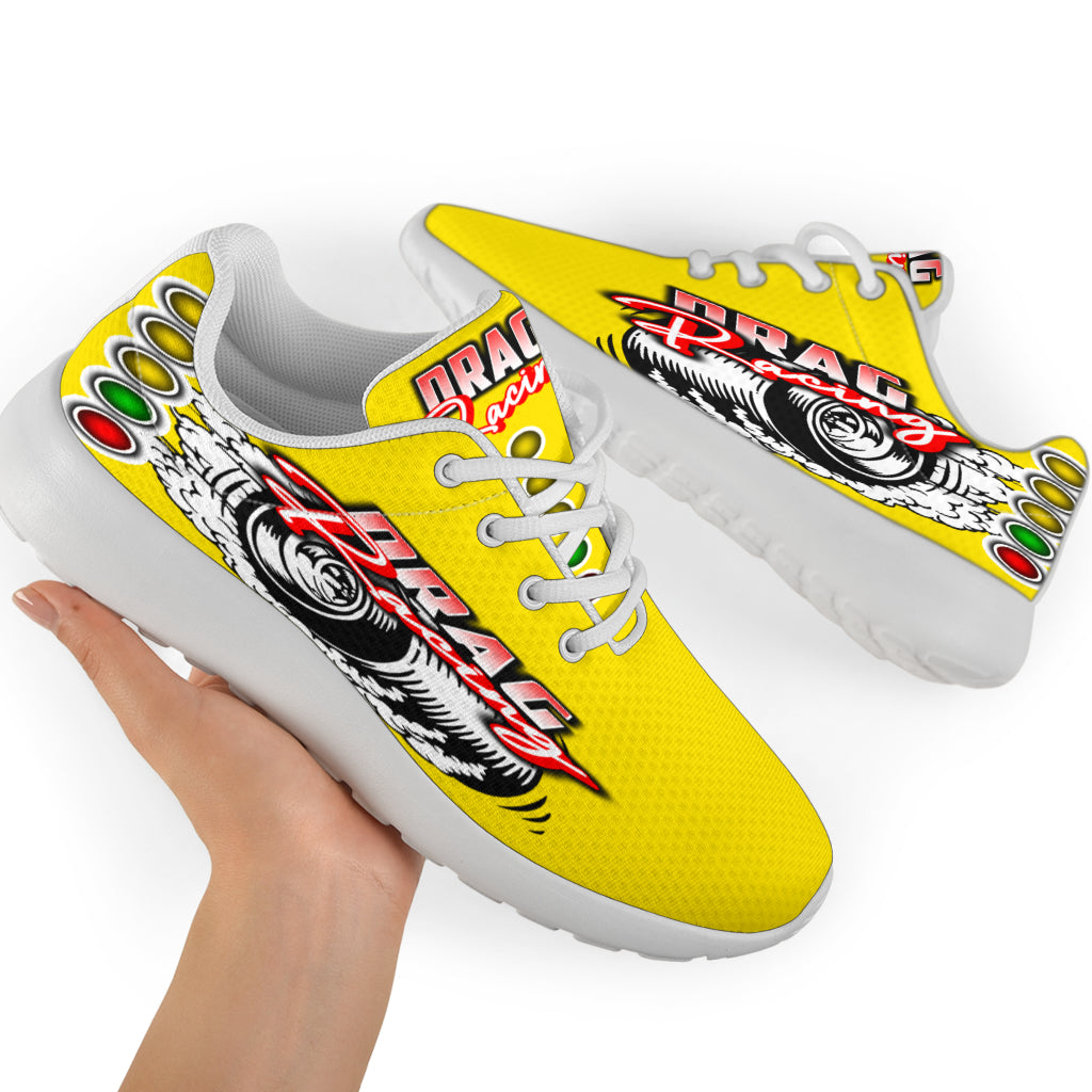 Bright yellow drag racing sneakers with breathable mesh and traction outsoles.