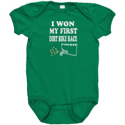 Cute baby onesies and toddler shirts featuring the "I Won My First Dirt Bike Race" graphic, crafted from ultra-soft ringspun cotton for future motocross champions.