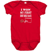 Cute baby onesies and toddler shirts featuring the "I Won My First Dirt Bike Race" graphic, crafted from ultra-soft ringspun cotton for future motocross champions.