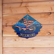 Demolition Derby Forever metal sign with derby cars and American flag artwork against natural wood planks.