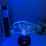 Drag Racing Chevy Chevelle 3D LED Illusion Lamp showing the iconic muscle car silhouette in a vibrant orange glow on a premium black base.