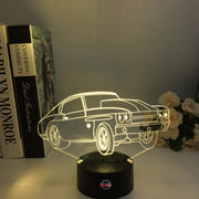 Drag Racing Chevy Chevelle 3D LED Illusion Lamp showing the iconic muscle car silhouette in a vibrant orange glow on a premium black base.