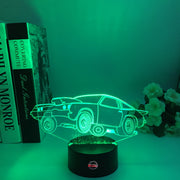 Drag Racing Chevy Monza 3D LED Illusion Lamp showing the aggressive racing silhouette in a vibrant purple glow on a premium black base.
