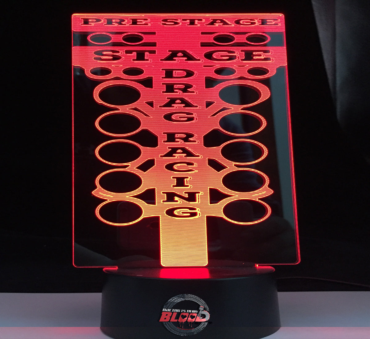 Drag Racing Tree 3D LED Lamp showing the detailed staging light silhouette glowing in a bright amber on a modern black base.
