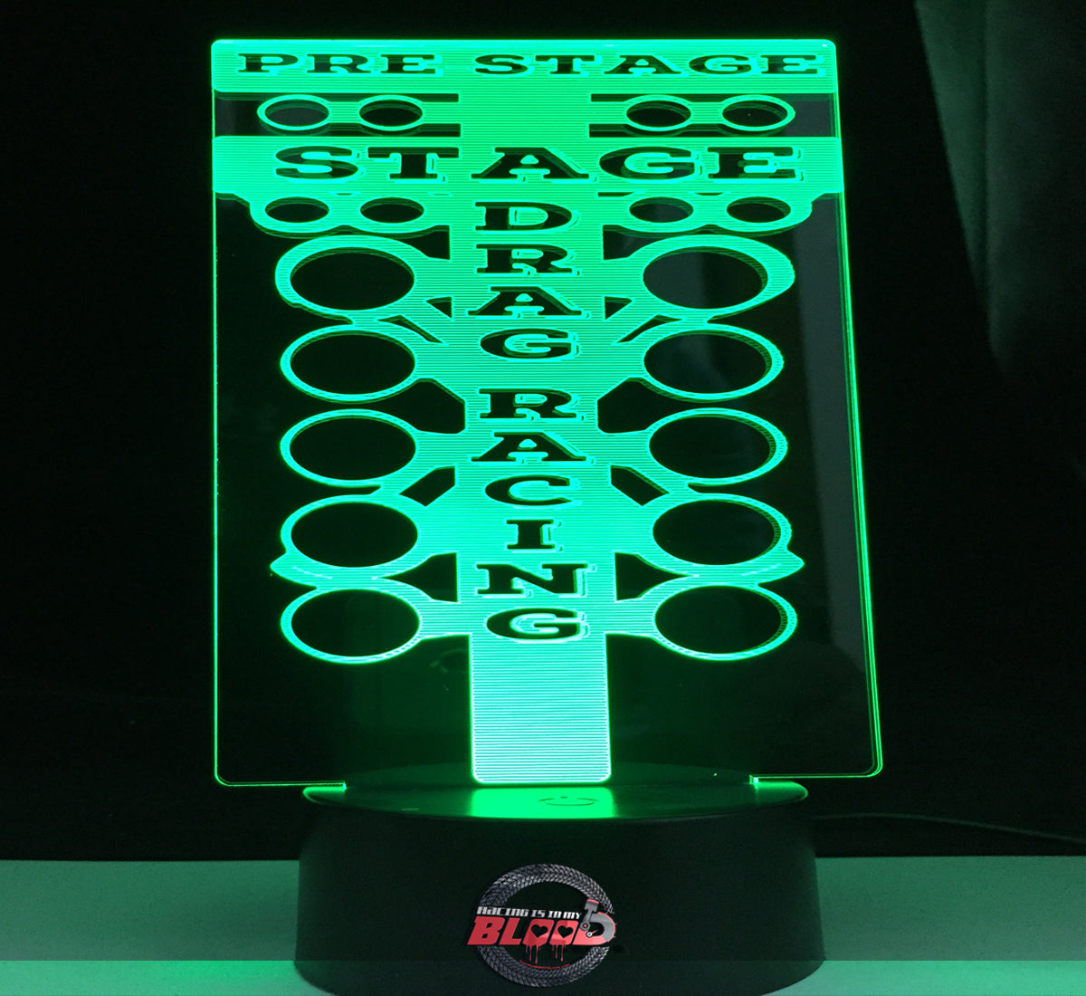 Drag Racing Tree 3D LED Lamp showing the detailed staging light silhouette glowing in a bright amber on a modern black base.