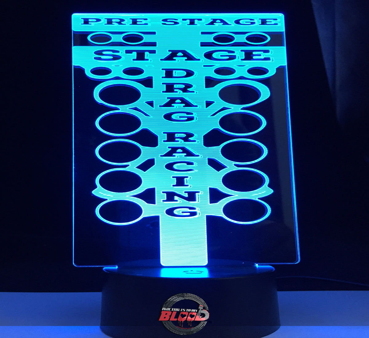 Drag Racing Tree 3D LED Lamp showing the detailed staging light silhouette glowing in a bright amber on a modern black base.