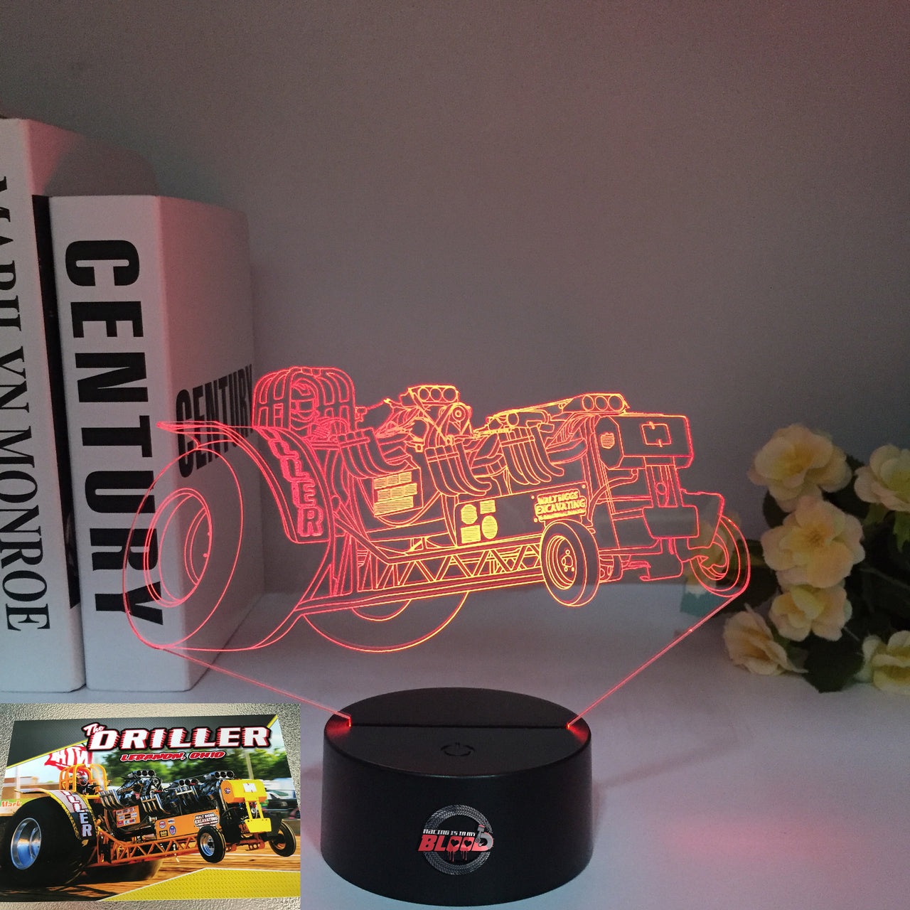 Dragster "The Driller" 3D LED Illusion Lamp showing a professional top fuel dragster silhouette in a vibrant green glow on a premium black base.