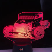 Dwarf Car Racing 3D LED Lamp showing a detailed vintage-style dwarf car silhouette glowing in a vibrant race-track yellow on a sleek black base.