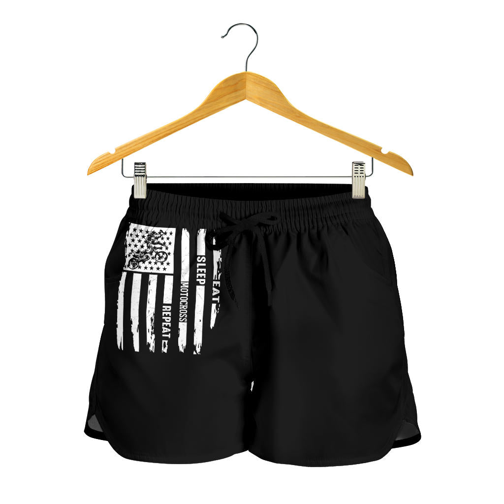Eat Sleep Motocross Repeat Women's Shorts in a custom-made racing style featuring moisture-wicking fabric, antibacterial technology, and an adjustable drawstring waistband for female dirt bike riders.
