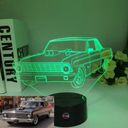 Ford Falcon 3D LED Illusion Lamp displaying the iconic muscle car silhouette in a vibrant blue glow on a premium black base.
