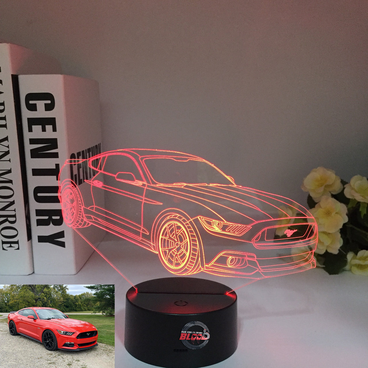 Ford Mustang 3D LED Illusion Lamp showing the iconic car silhouette in vibrant blue light on a black base.