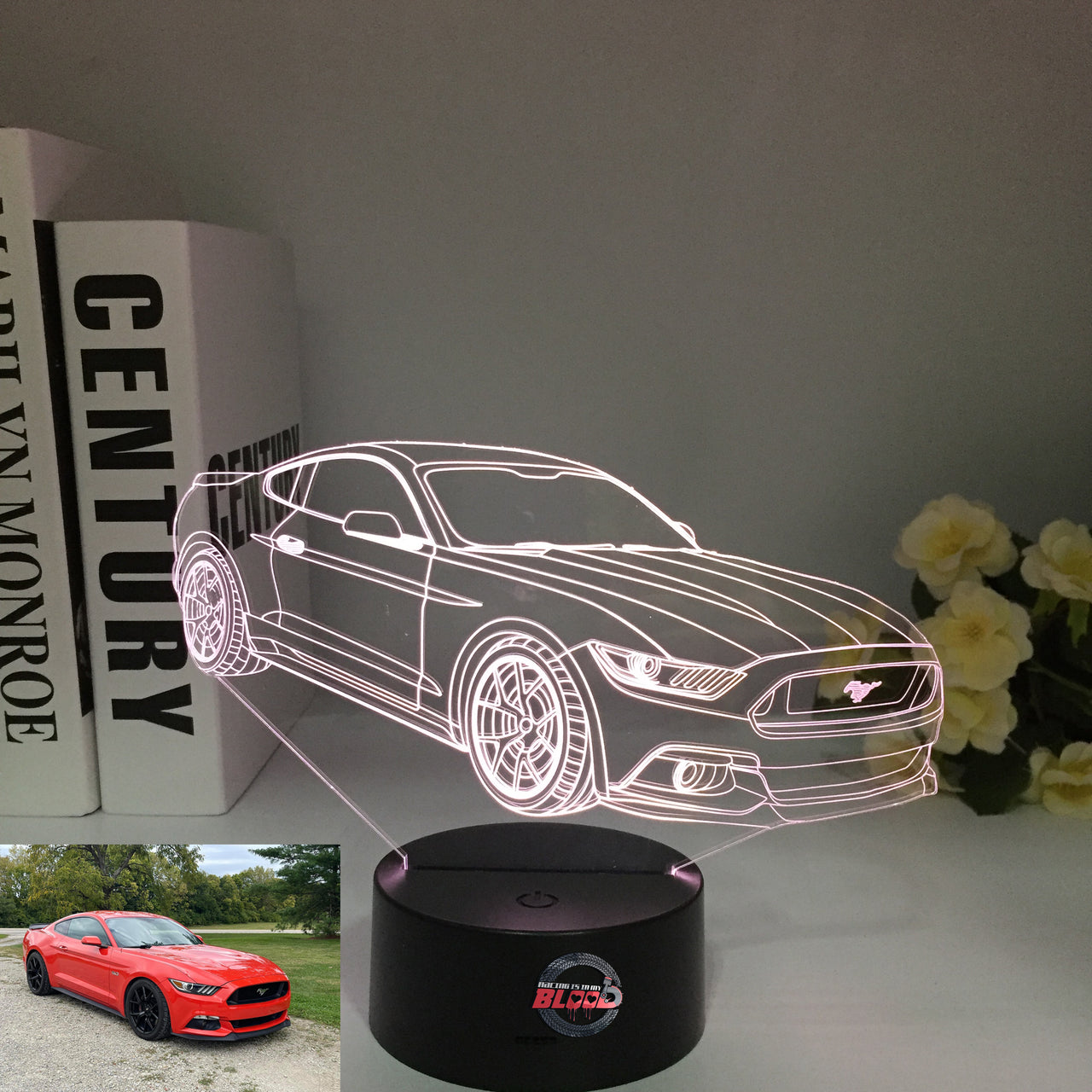 Ford Mustang 3D LED Illusion Lamp showing the iconic car silhouette in vibrant blue light on a black base.