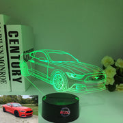 Ford Mustang 3D LED Illusion Lamp showing the iconic car silhouette in vibrant blue light on a black base.