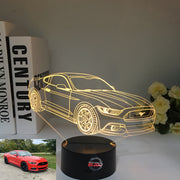 Ford Mustang 3D LED Illusion Lamp showing the iconic car silhouette in vibrant blue light on a black base.