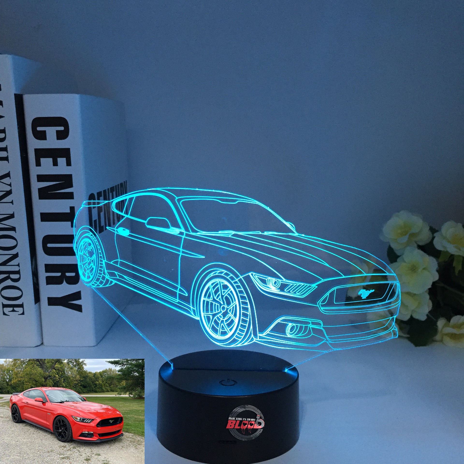 Ford Mustang 3D LED Illusion Lamp showing the iconic car silhouette in vibrant blue light on a black base.