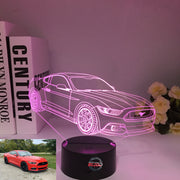Ford Mustang 3D LED Illusion Lamp showing the iconic car silhouette in vibrant blue light on a black base.