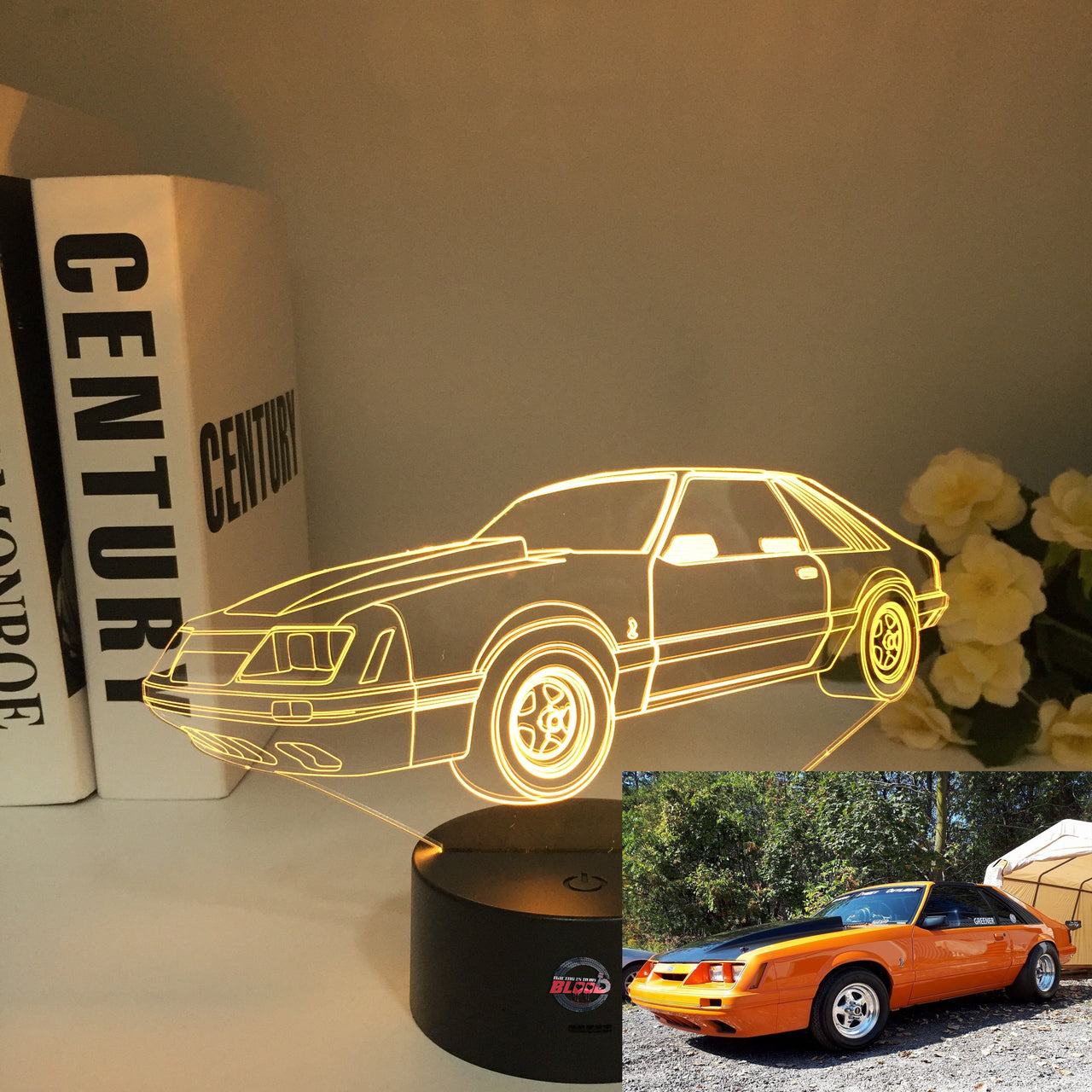 Ford Mustang Logo 3D LED Lamp showing the galloping horse silhouette in vibrant red light on a high-quality black base.