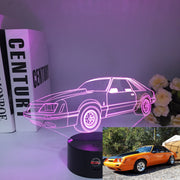 Ford Mustang Logo 3D LED Lamp showing the galloping horse silhouette in vibrant red light on a high-quality black base.