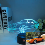 Ford Mustang Logo 3D LED Lamp showing the galloping horse silhouette in vibrant red light on a high-quality black base.