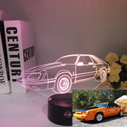 Ford Mustang Logo 3D LED Lamp showing the galloping horse silhouette in vibrant red light on a high-quality black base.