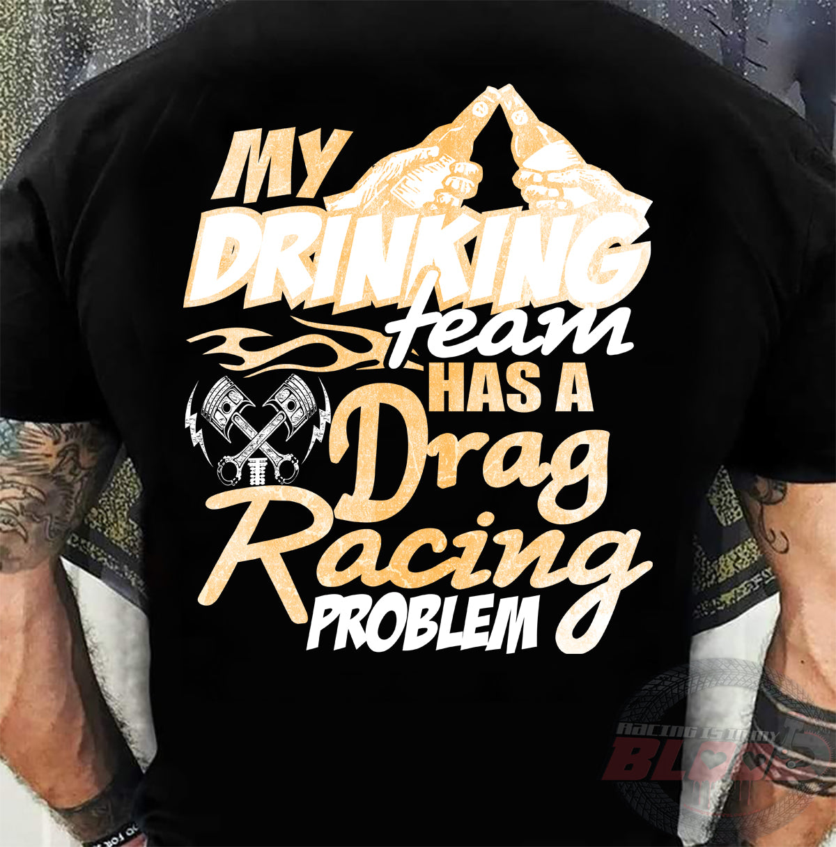 Funny drag racing apparel featuring the quote "My Drinking Team Has A Drag Racing Problem", available in premium t-shirts, crewneck sweatshirts, tanks, and warm hoodies.
