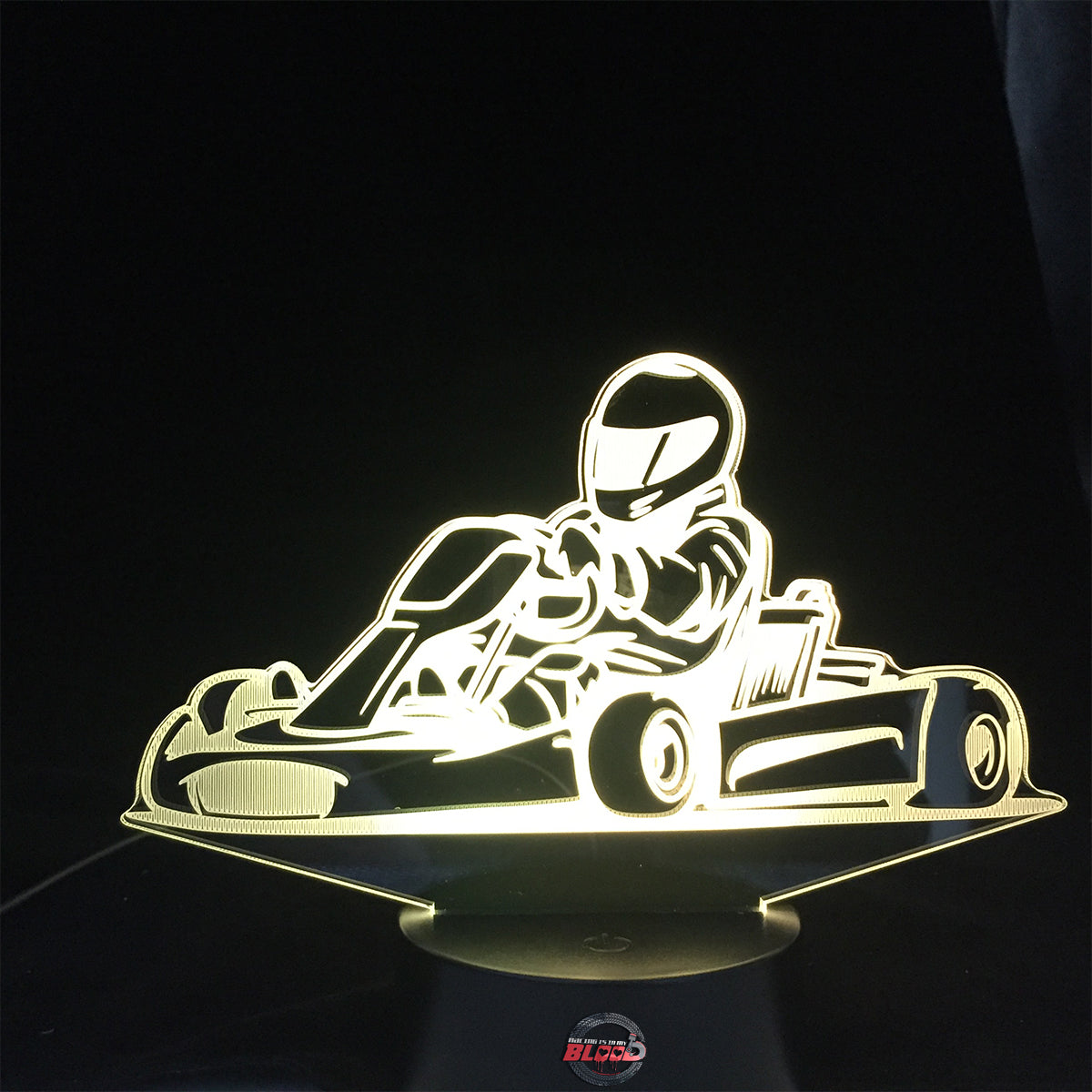 Go-Kart Racing 3D LED Lamp featuring a detailed racing kart silhouette glowing in a vibrant lime green on a premium black base.