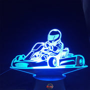 Go-Kart Racing 3D LED Lamp featuring a detailed racing kart silhouette glowing in a vibrant lime green on a premium black base.