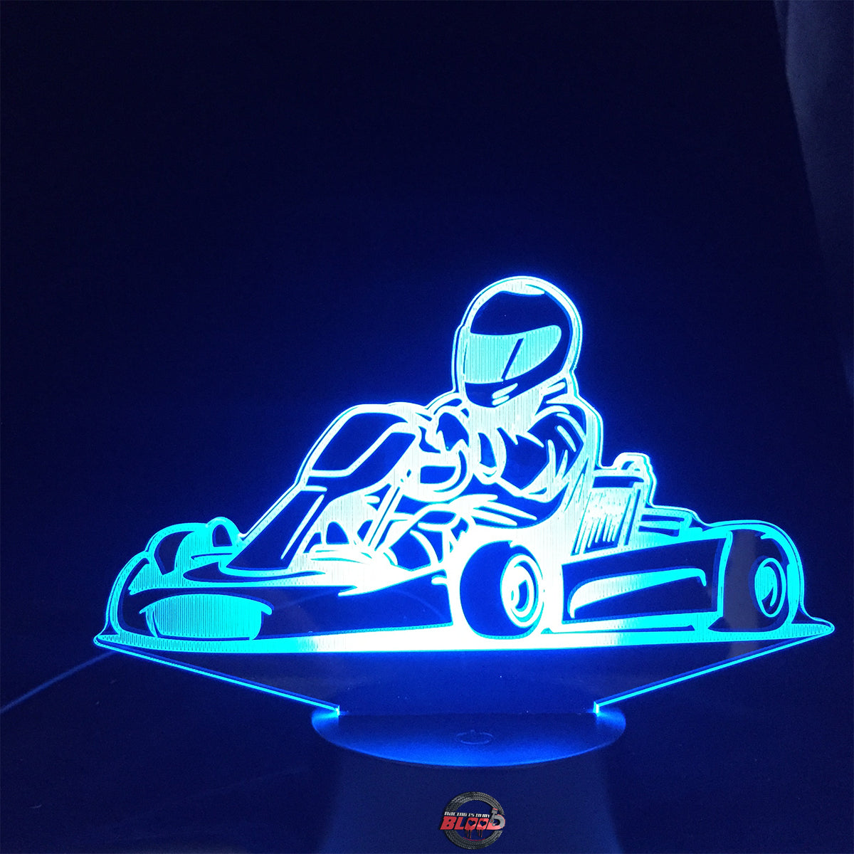 Go-Kart Racing 3D LED Lamp featuring a detailed racing kart silhouette glowing in a vibrant lime green on a premium black base.