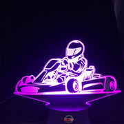 Go-Kart Racing 3D LED Lamp featuring a detailed racing kart silhouette glowing in a vibrant lime green on a premium black base.