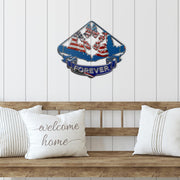 Go-Kart Racing USA metal sign mounted above a wooden bench with white cushions.