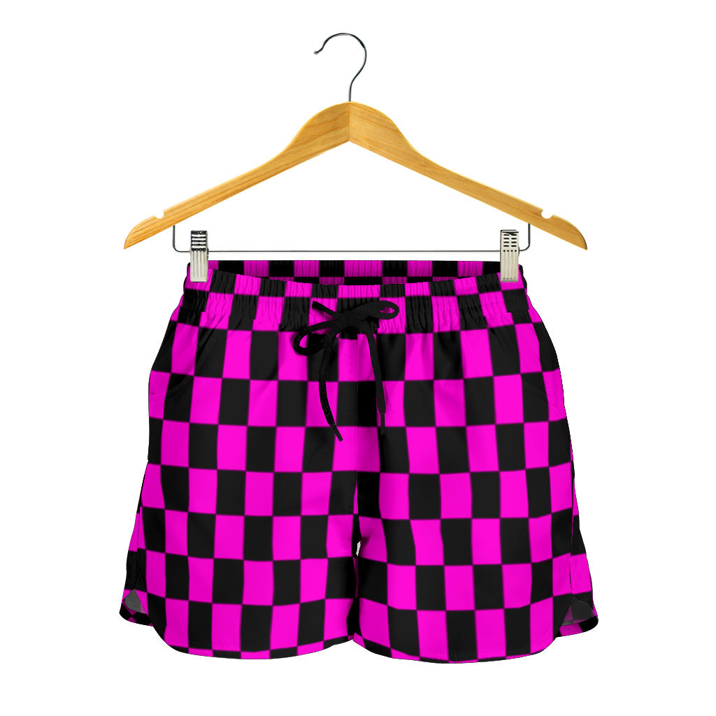 High-performance women's athletic shorts featuring a bright pink and black checkered pattern, designed with an elastic drawstring waist and functional side pockets.