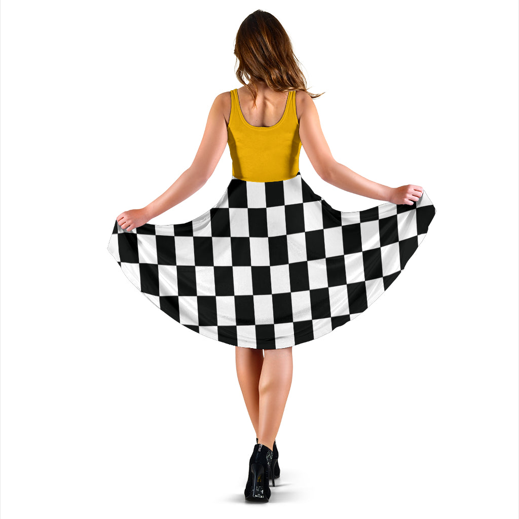 High-visibility mixed orange and black checkered flag midi dress with pockets, designed for motorsports fans on race day.