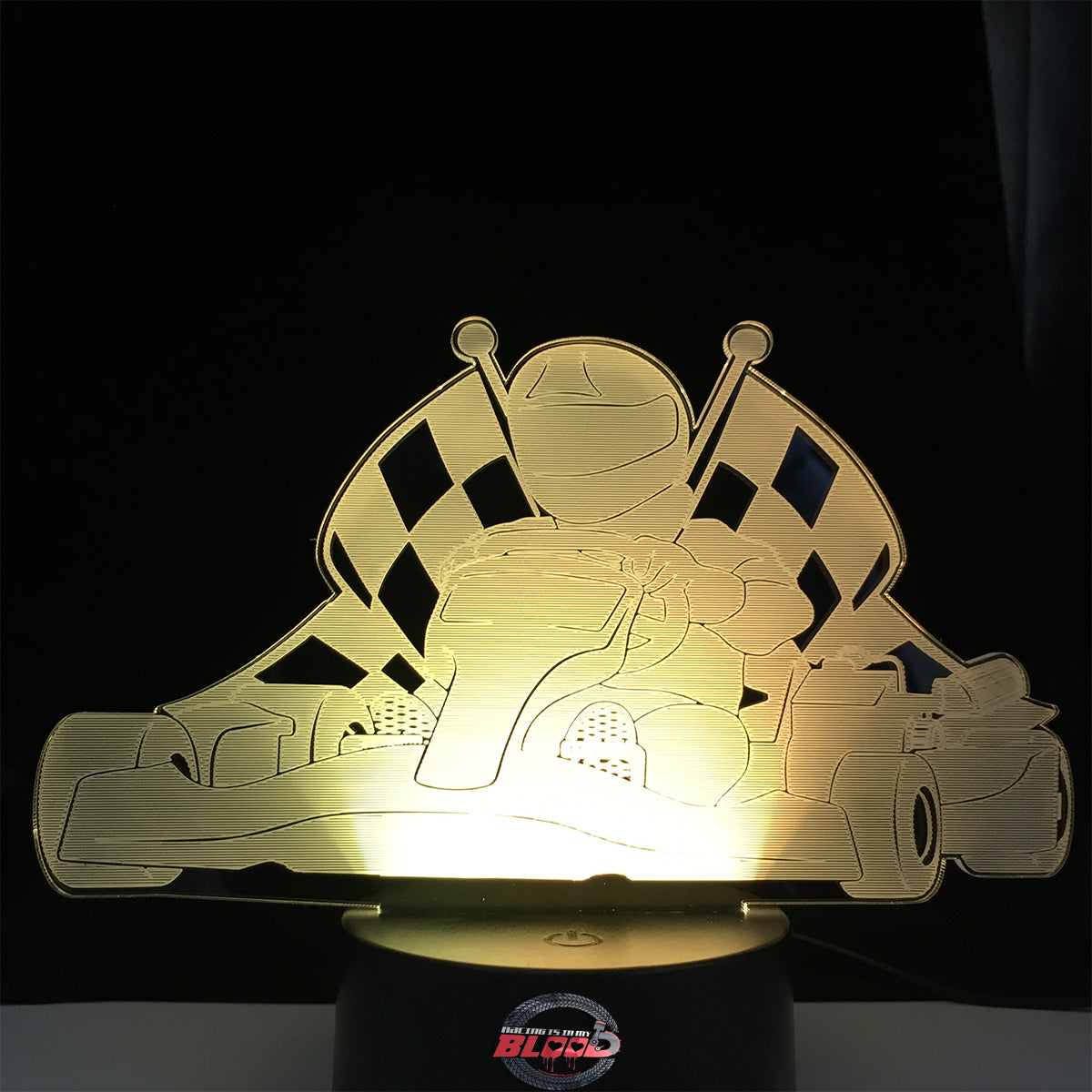 Kart Racing 3D LED Lamp featuring a detailed go-kart and driver silhouette glowing in a bright racing green on a modern black base.