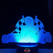Kart Racing 3D LED Lamp featuring a detailed go-kart and driver silhouette glowing in a bright racing green on a modern black base.