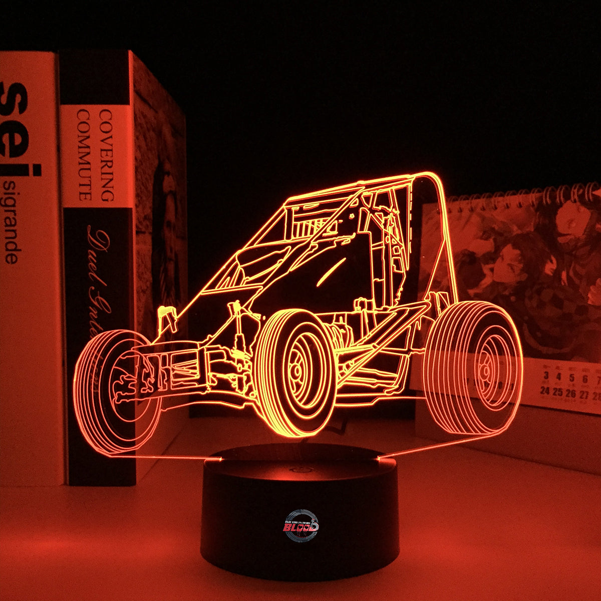 Midget Sprint Car LED Lamp featuring a detailed dirt track racing silhouette glowing in a vibrant orange on a premium black base.