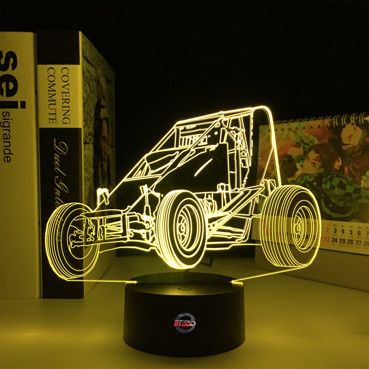 Midget Sprint Car LED Lamp featuring a detailed dirt track racing silhouette glowing in a vibrant orange on a premium black base.