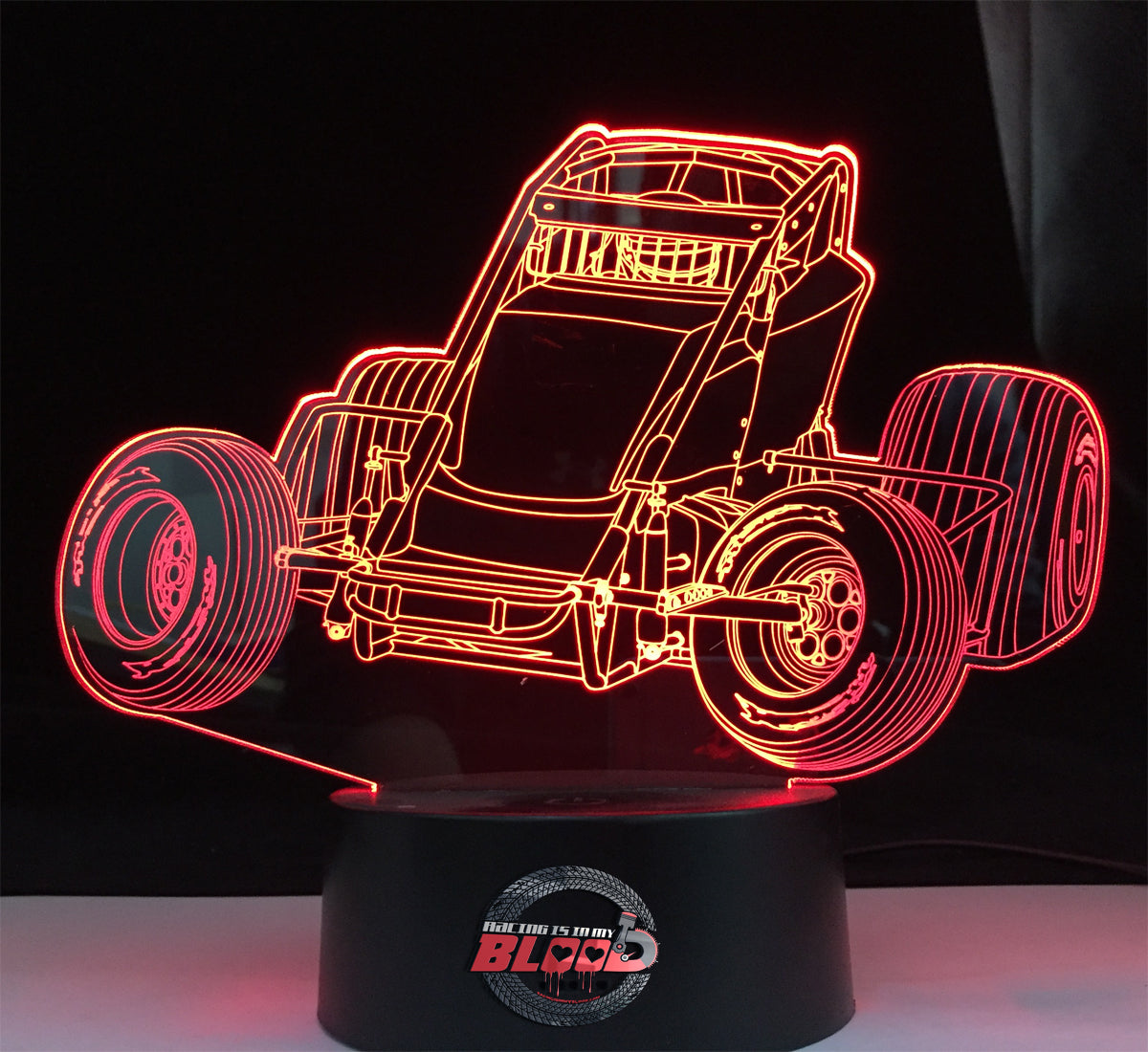 Non-Wing Sprint Car 3D LED Lamp featuring a detailed open-wheel dirt track racer silhouette glowing in a bright racing orange on a modern black base.