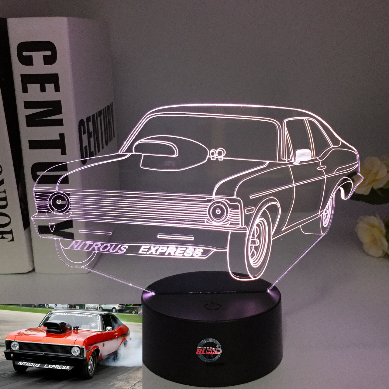 Nova Express Nitrous 3D LED Illusion Lamp showing an aggressive drag racing Chevy Nova silhouette in a vibrant blue glow on a premium black base.