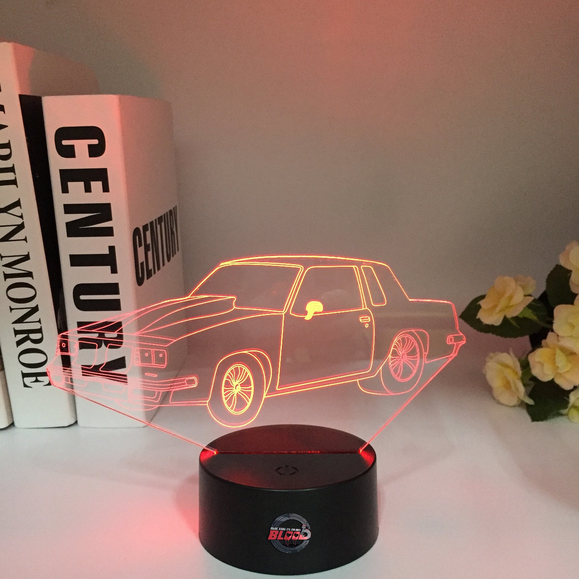 Oldsmobile Cutlass 3D LED Illusion Lamp displaying the classic muscle car silhouette in a vibrant white glow on a premium black base.