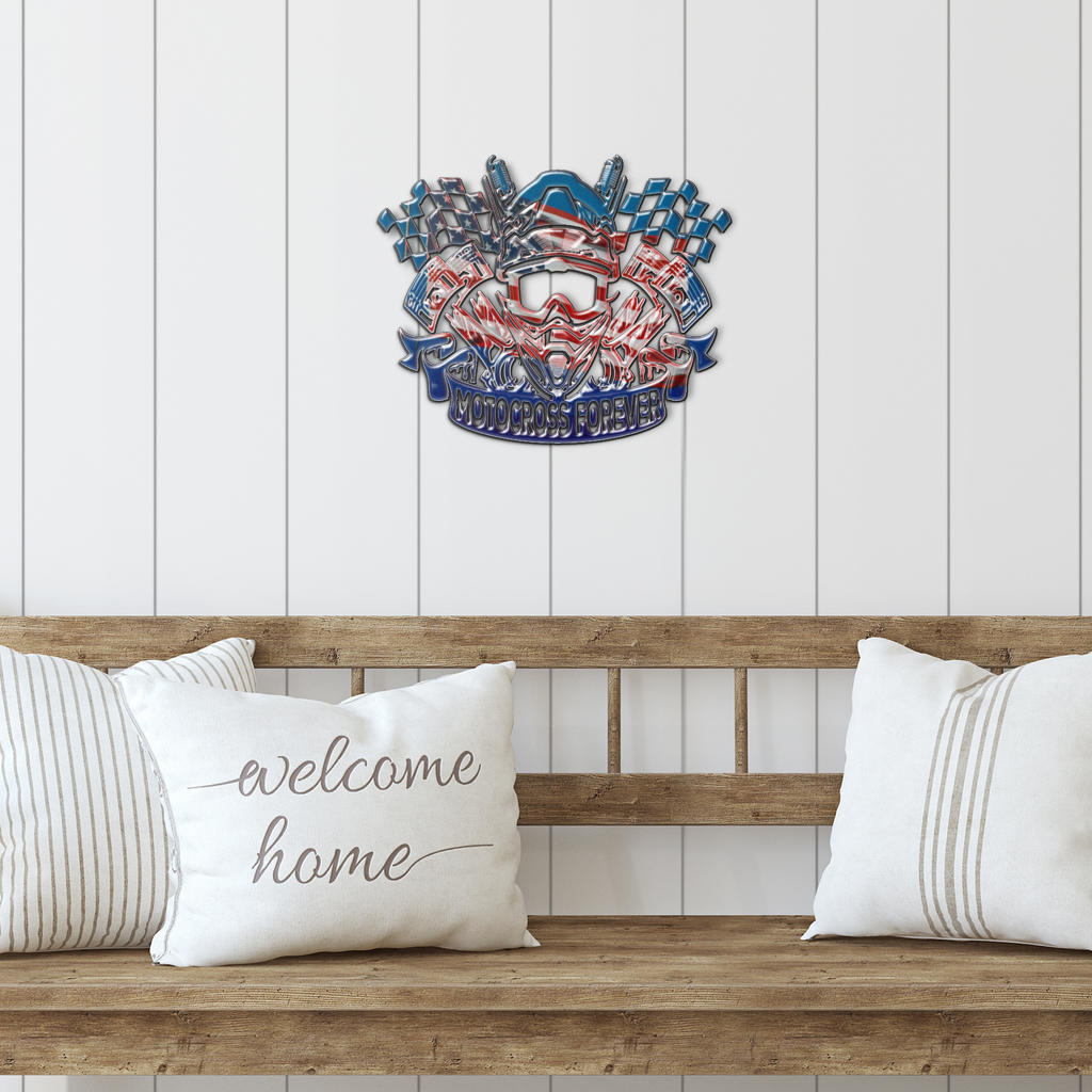 Patriotic motocross helmet sign above a wooden bench with white cushions.