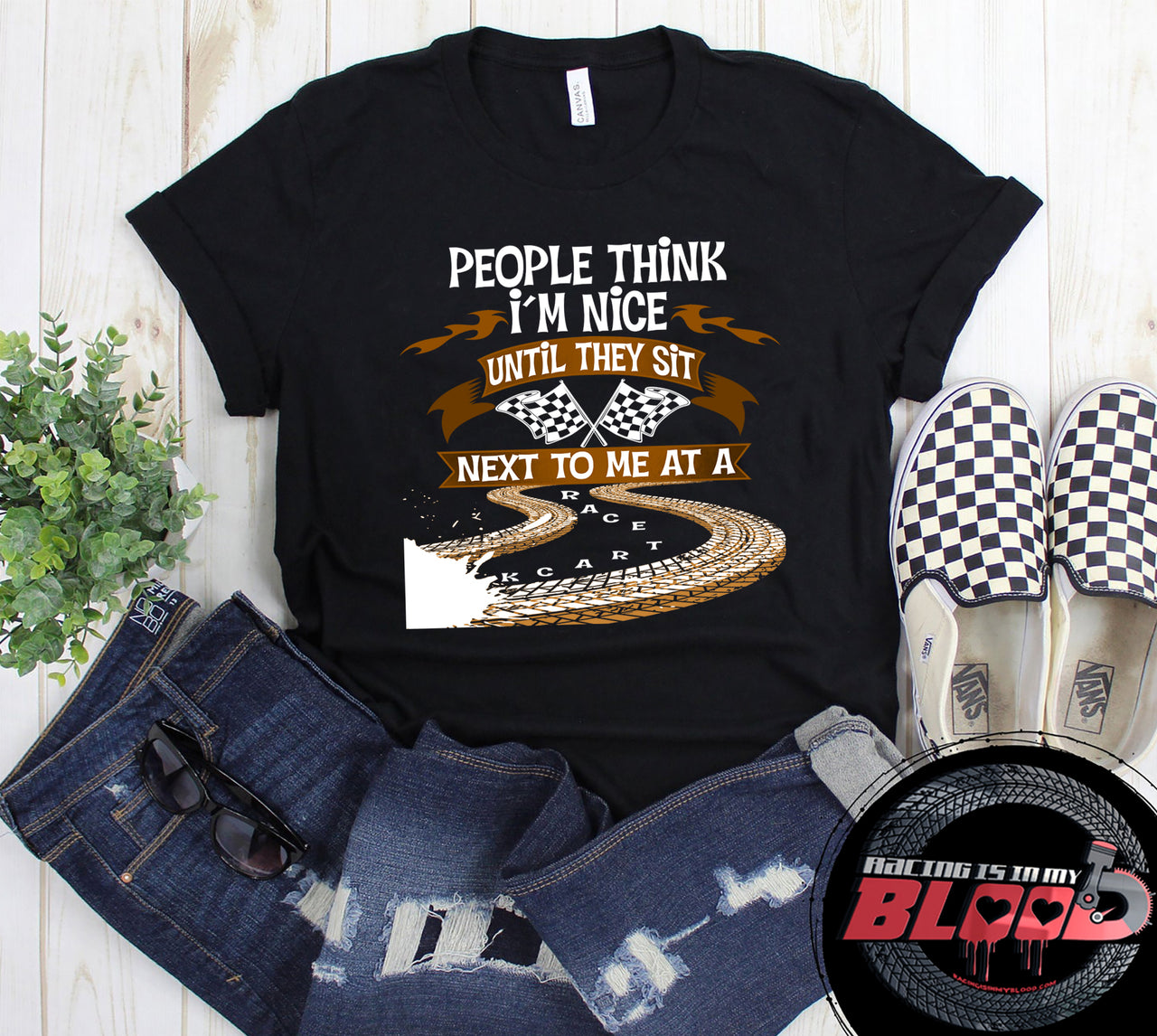 "People Think I'm Nice Until They Sit Next To Me At A Race Track" funny racing fan design shown on a variety of apparel including women's tees, tanks, and hoodies.