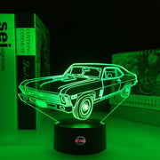 Personalized 1969 Chevy Nova LED Lamp featuring a custom name and number on a glowing muscle car silhouette, shown in a vibrant orange on a black base.