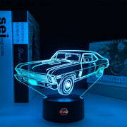Personalized 1969 Chevy Nova LED Lamp featuring a custom name and number on a glowing muscle car silhouette, shown in a vibrant orange on a black base.
