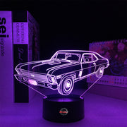 Personalized 1969 Chevy Nova LED Lamp featuring a custom name and number on a glowing muscle car silhouette, shown in a vibrant orange on a black base.