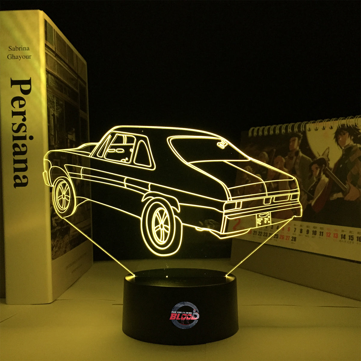 Personalized 1969 Chevy Nova LED Lamp featuring a custom name on a glowing muscle car silhouette, shown in a vibrant red on a black base.
