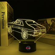 Personalized 1969 Chevy Nova LED Lamp featuring a custom name on a glowing muscle car silhouette, shown in a vibrant red on a black base.