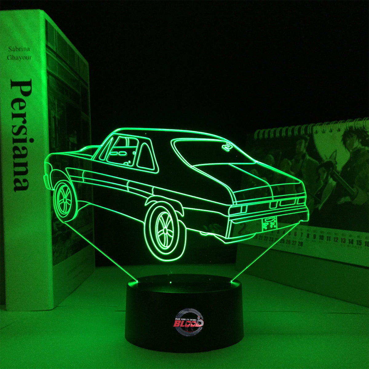 Personalized 1969 Chevy Nova LED Lamp featuring a custom name on a glowing muscle car silhouette, shown in a vibrant red on a black base.