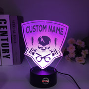 Personalized Drag Racing 3D LED Illusion Lamp featuring a custom name and racing number laser-etched alongside a dragster silhouette, glowing in a vibrant green on a black base.